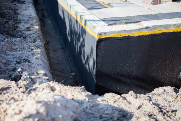 Professional Waterproofing technician working in Dacula, GA